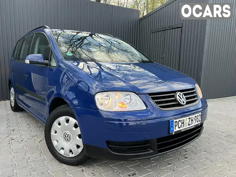 Минивэн Volkswagen Touran 2004 1.6 л. Ручная / Механика обл. Львовская, Дрогобыч - Фото 1/21