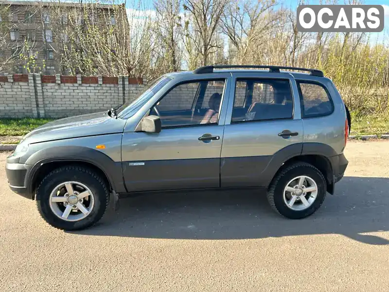 Позашляховик / Кросовер Chevrolet Niva 2010 1.69 л. Ручна / Механіка обл. Донецька, Слов'янськ - Фото 1/11