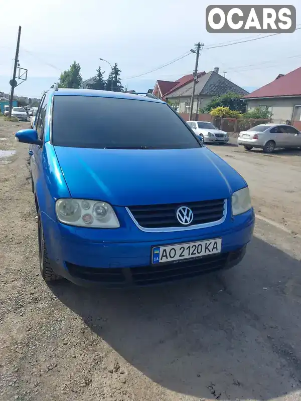 Мінівен Volkswagen Touran 2004 1.6 л. Ручна / Механіка обл. Закарпатська, Ужгород - Фото 1/14