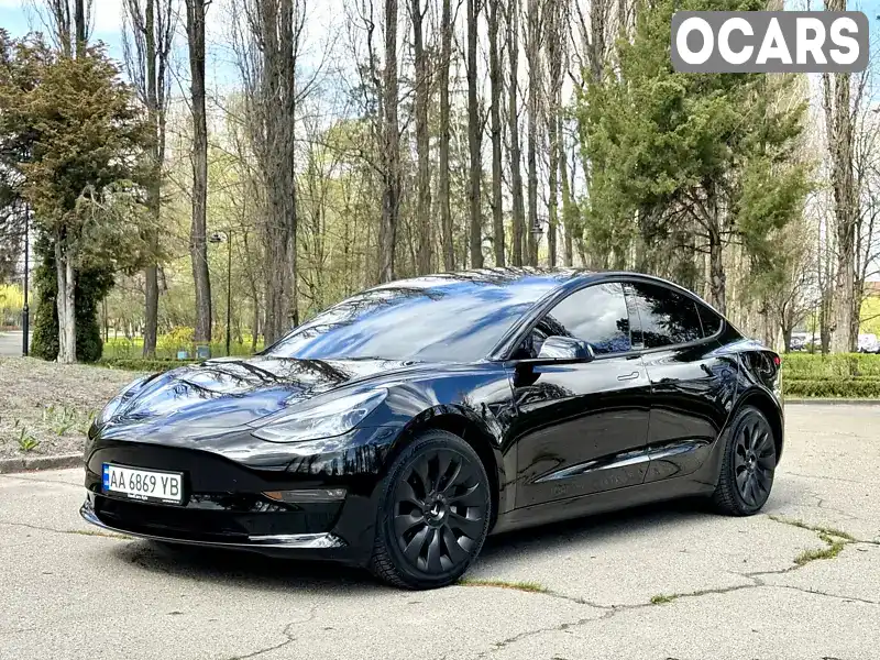 Седан Tesla Model 3 2023 null_content л. Автомат обл. Киевская, Киев - Фото 1/21