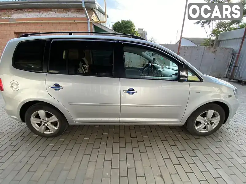 Мінівен Volkswagen Touran 2013 1.97 л. Ручна / Механіка обл. Миколаївська, Очаків - Фото 1/18