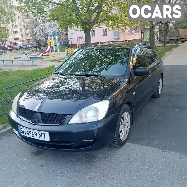 Седан Mitsubishi Lancer 2007 null_content л. Автомат обл. Київська, Київ - Фото 1/5