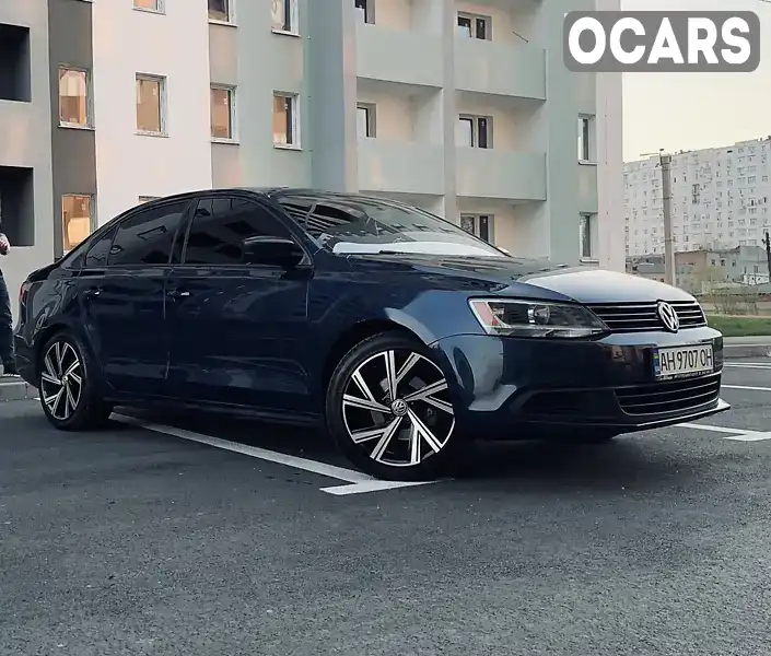 Седан Volkswagen Jetta 2014 2 л. Автомат обл. Харьковская, Харьков - Фото 1/21