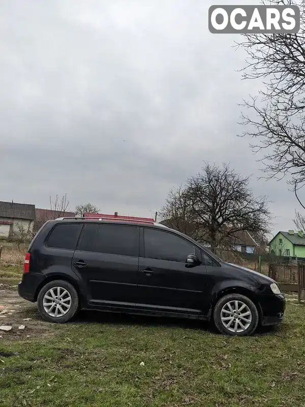 Мінівен Volkswagen Touran 2004 1.97 л. обл. Львівська, Львів - Фото 1/21