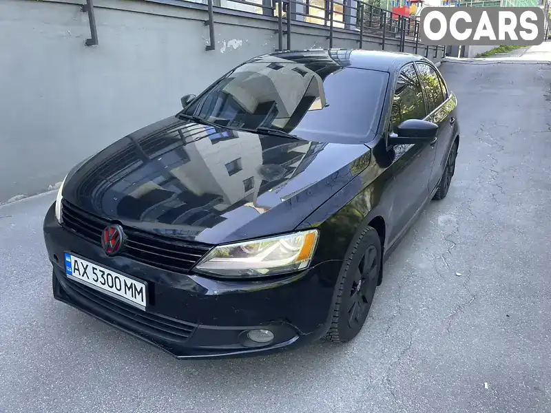 Седан Volkswagen Jetta 2013 2 л. Автомат обл. Киевская, Киев - Фото 1/15