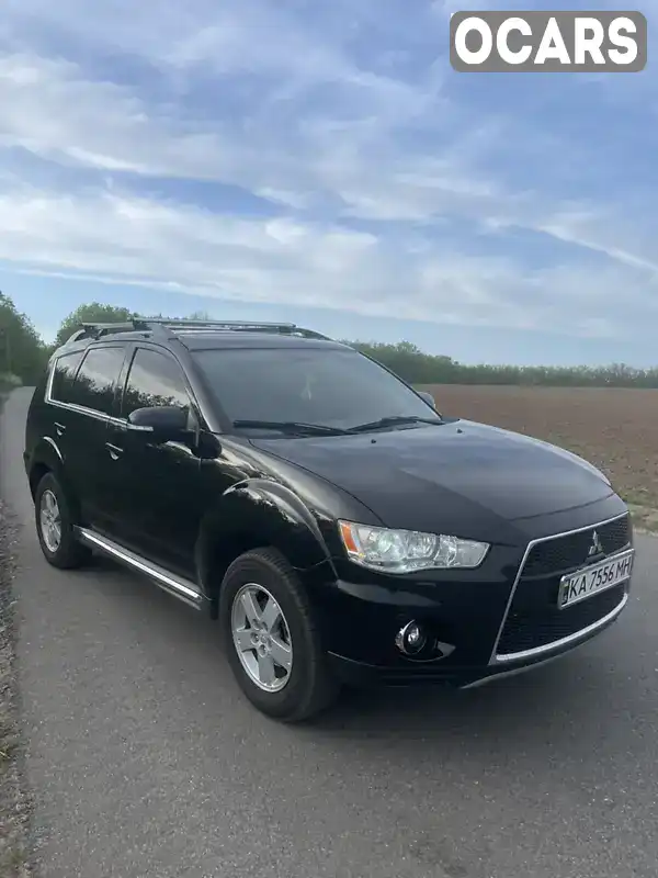 Внедорожник / Кроссовер Mitsubishi Outlander 2011 2.2 л. Робот обл. Харьковская, Харьков - Фото 1/21