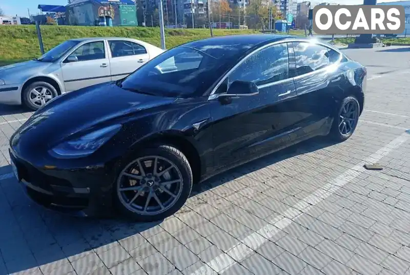 Седан Tesla Model 3 2018 null_content л. Автомат обл. Львівська, Львів - Фото 1/5