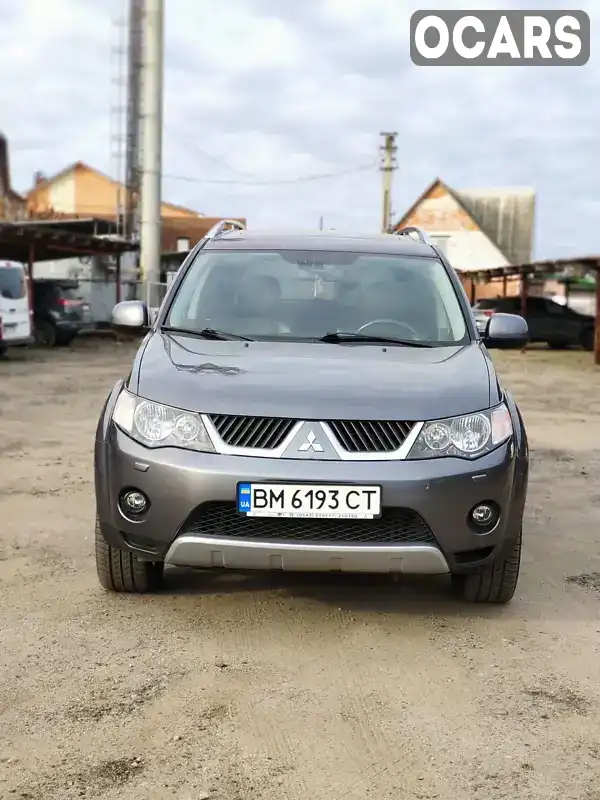 Внедорожник / Кроссовер Mitsubishi Outlander XL 2007 2.4 л. Вариатор обл. Сумская, Сумы - Фото 1/21