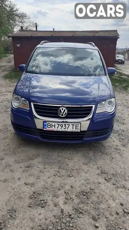 Мінівен Volkswagen Touran 2009 1.39 л. Ручна / Механіка обл. Миколаївська, Первомайськ - Фото 1/10