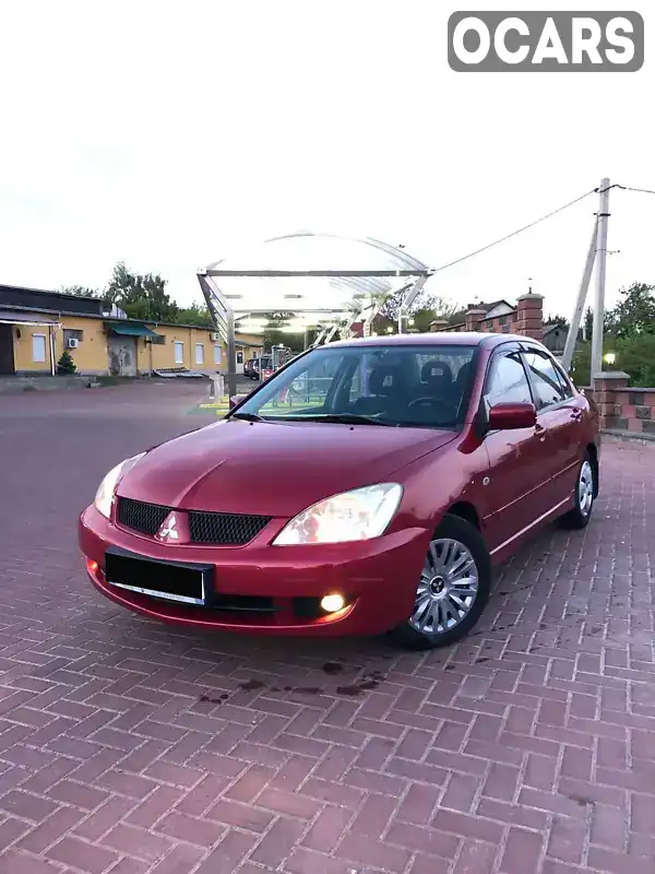 Седан Mitsubishi Lancer 2006 1.58 л. Ручна / Механіка обл. Рівненська, Рівне - Фото 1/13