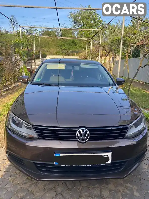 Седан Volkswagen Jetta 2011 1.2 л. Ручная / Механика обл. Закарпатская, Мукачево - Фото 1/17