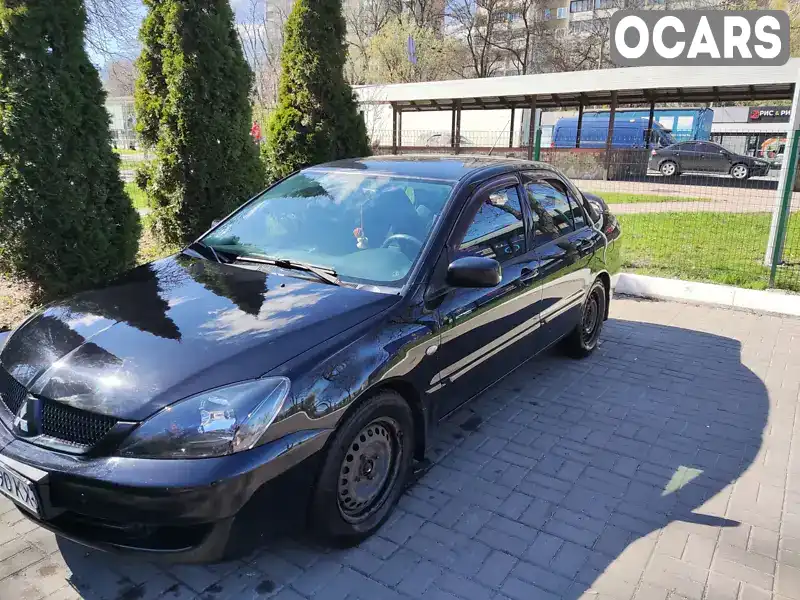 Седан Mitsubishi Lancer 2008 1.58 л. Автомат обл. Киевская, Киев - Фото 1/21