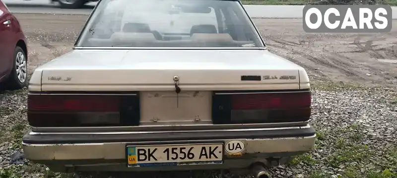 Седан Nissan Bluebird 1986 1.8 л. Ручная / Механика обл. Тернопольская, Тернополь - Фото 1/9