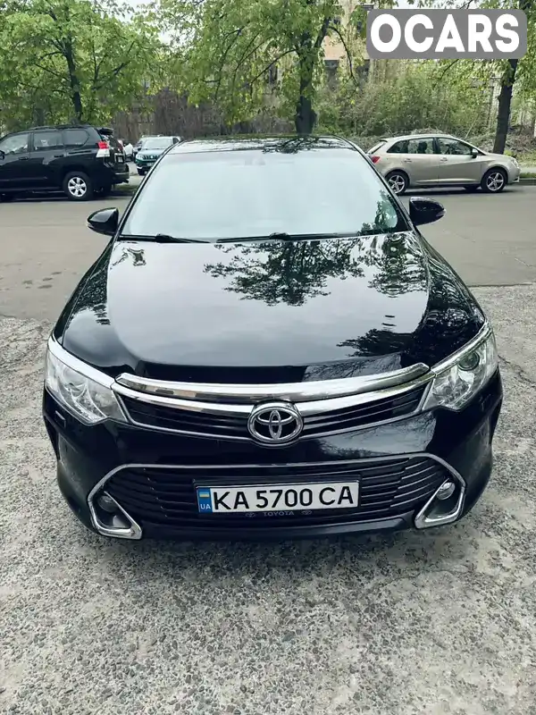 Седан Toyota Camry 2014 2.49 л. Автомат обл. Київська, Київ - Фото 1/12