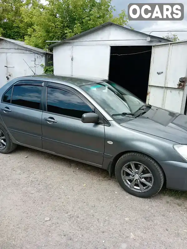 Седан Mitsubishi Lancer 2008 1.6 л. Ручная / Механика обл. Полтавская, Кременчуг - Фото 1/12