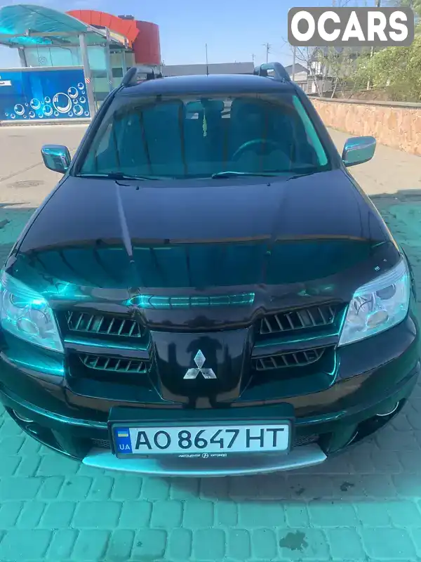 Позашляховик / Кросовер Mitsubishi Outlander 2008 2 л. Ручна / Механіка обл. Рівненська, Березне - Фото 1/13