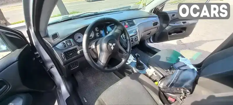 Седан Mitsubishi Lancer 2008 1.6 л. Ручна / Механіка обл. Дніпропетровська, Дніпро (Дніпропетровськ) - Фото 1/9