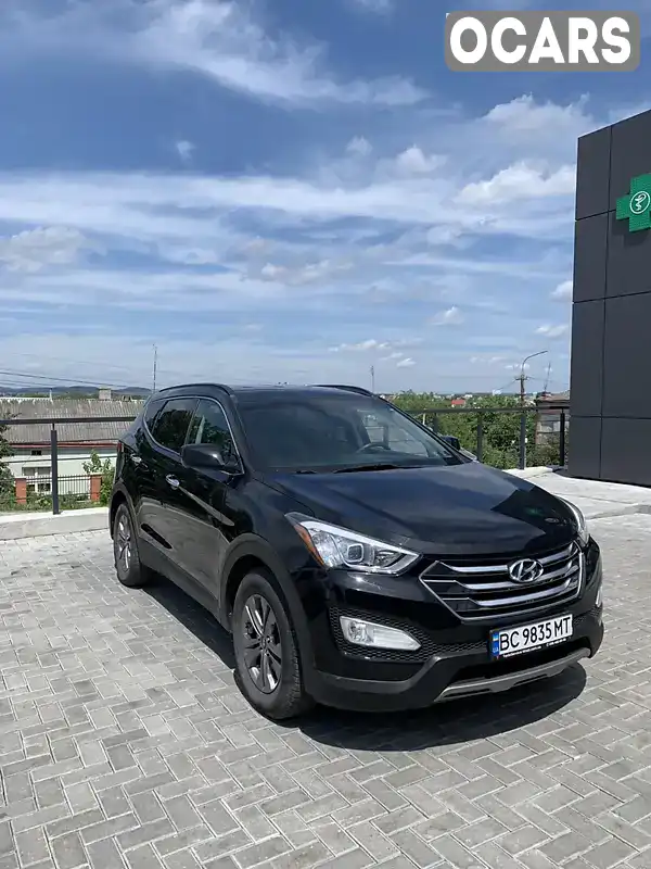 Внедорожник / Кроссовер Hyundai Santa FE 2015 2.4 л. Автомат обл. Львовская, Золочев - Фото 1/21