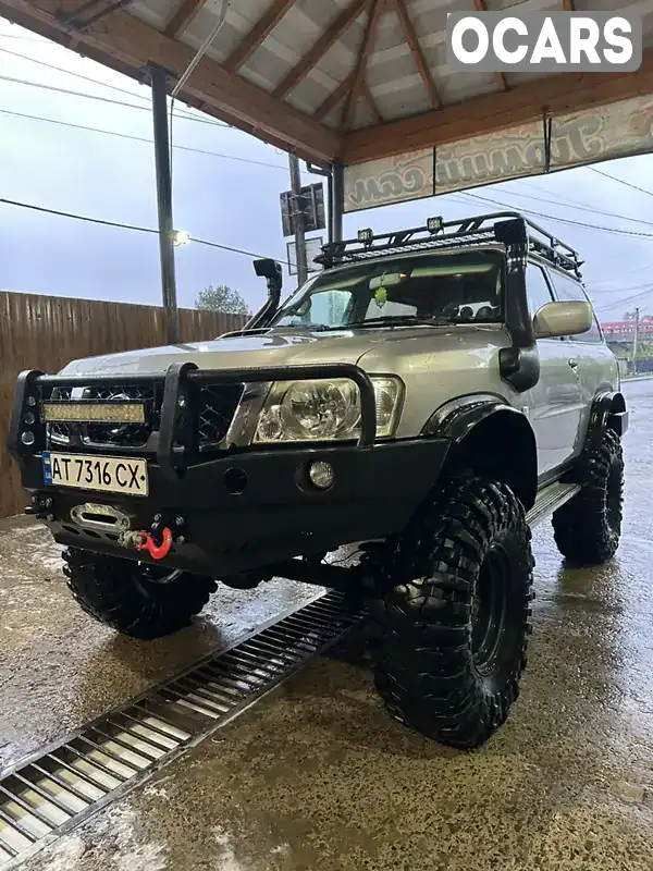 Внедорожник / Кроссовер Nissan Patrol 2005 3 л. Ручная / Механика обл. Ивано-Франковская, Ивано-Франковск - Фото 1/21