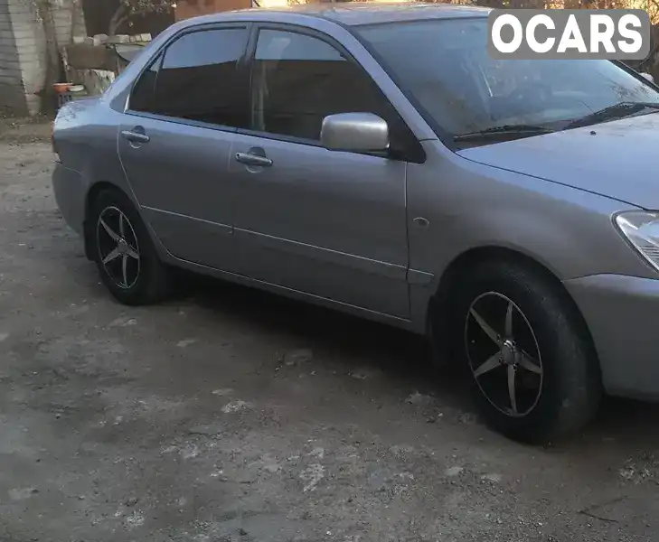 Седан Mitsubishi Lancer 2006 1.6 л. Ручная / Механика обл. Днепропетровская, Днепр (Днепропетровск) - Фото 1/21