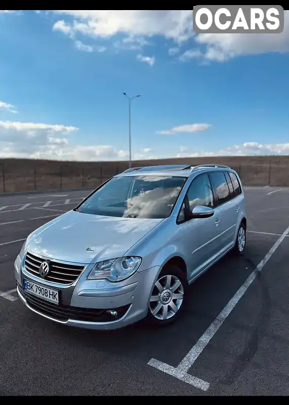 Мінівен Volkswagen Touran 2009 1.4 л. Автомат обл. Рівненська, Рівне - Фото 1/21