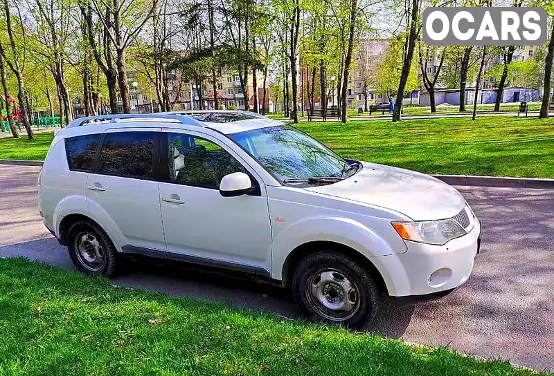 Внедорожник / Кроссовер Mitsubishi Outlander 2008 2.2 л. Ручная / Механика обл. Харьковская, Харьков - Фото 1/6