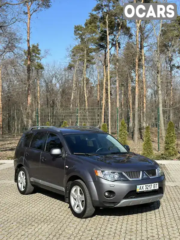 Позашляховик / Кросовер Mitsubishi Outlander XL 2008 2.36 л. Варіатор обл. Харківська, Харків - Фото 1/17