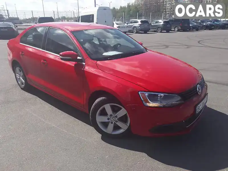 Седан Volkswagen Jetta 2013 2 л. Автомат обл. Львівська, Львів - Фото 1/21