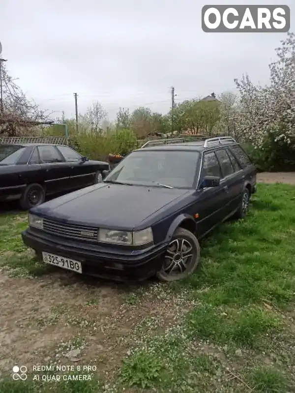 Универсал Nissan Bluebird 1990 2 л. Ручная / Механика обл. Волынская, Владимир-Волынский - Фото 1/4