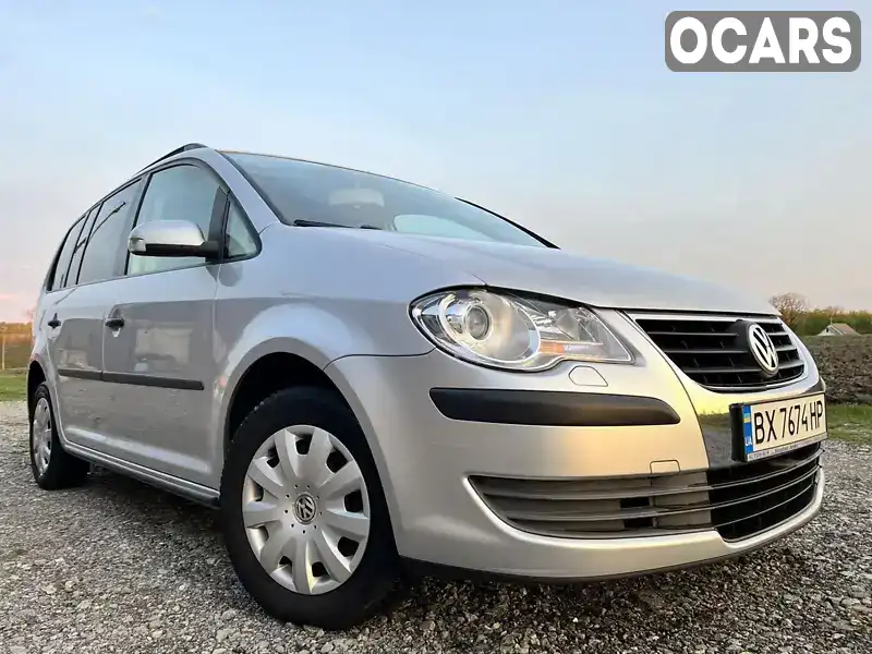 Минивэн Volkswagen Touran 2006 1.39 л. Ручная / Механика обл. Хмельницкая, Дунаевцы - Фото 1/21