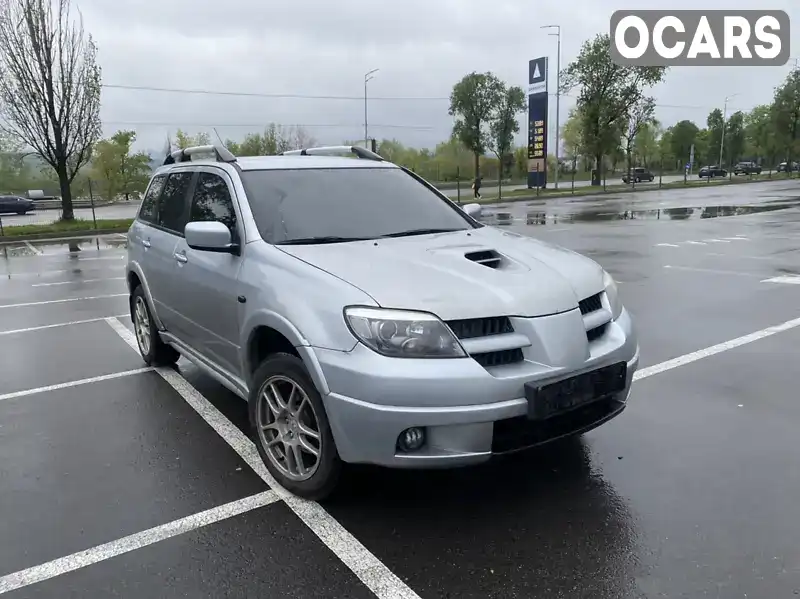 Внедорожник / Кроссовер Mitsubishi Outlander 2005 2 л. Ручная / Механика обл. Киевская, Киев - Фото 1/13