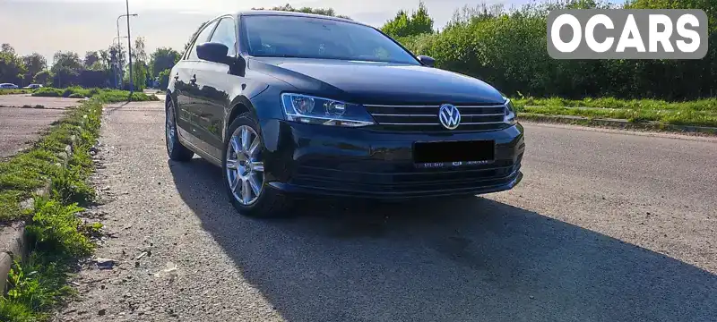 Седан Volkswagen Jetta 2015 2 л. Автомат обл. Львівська, Львів - Фото 1/21