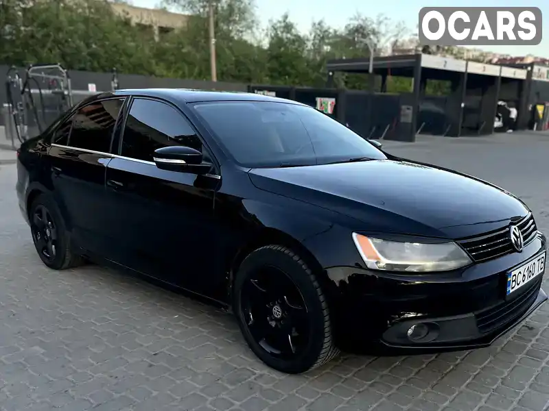 Седан Volkswagen Jetta 2013 2.48 л. Автомат обл. Львовская, Львов - Фото 1/16