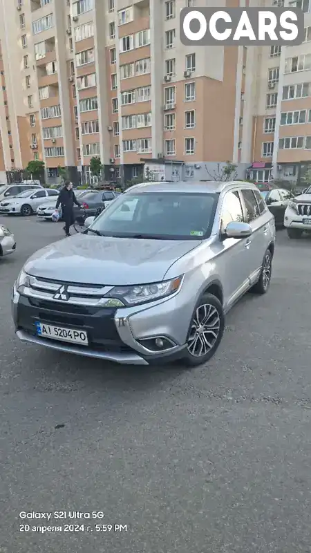 Позашляховик / Кросовер Mitsubishi Outlander 2015 2.36 л. Автомат обл. Київська, Київ - Фото 1/15