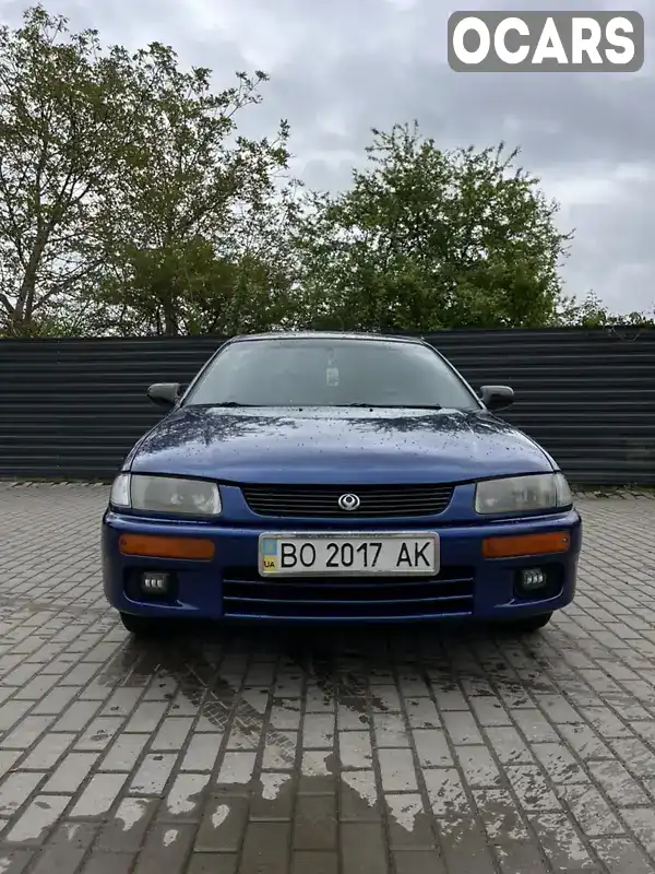 Седан Mazda 323 1996 1.5 л. Ручна / Механіка обл. Івано-Франківська, Івано-Франківськ - Фото 1/10