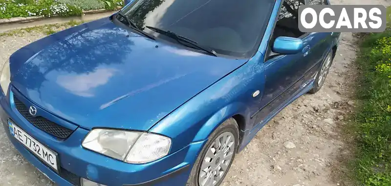 Седан Mazda 323 1999 1.6 л. Ручная / Механика обл. Днепропетровская, Днепр (Днепропетровск) - Фото 1/11