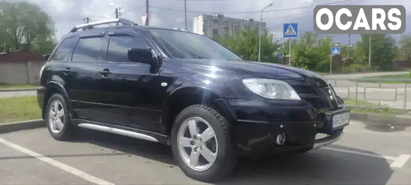 Внедорожник / Кроссовер Mitsubishi Outlander 2007 2.38 л. Автомат обл. Киевская, Киев - Фото 1/14