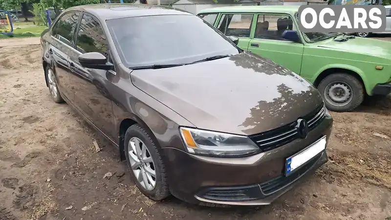 Седан Volkswagen Jetta 2013 2.5 л. Автомат обл. Дніпропетровська, Дніпро (Дніпропетровськ) - Фото 1/8