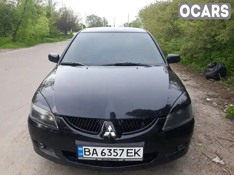 Седан Mitsubishi Lancer 2005 2 л. Ручная / Механика обл. Кировоградская, Кропивницкий (Кировоград) - Фото 1/19