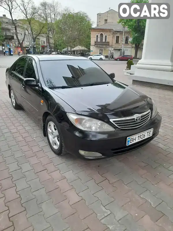 Седан Toyota Camry 2003 2.4 л. Автомат обл. Одесская, Одесса - Фото 1/20