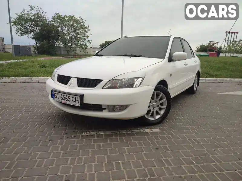 Седан Mitsubishi Lancer 2008 1.6 л. Ручная / Механика обл. Одесская, Одесса - Фото 1/21