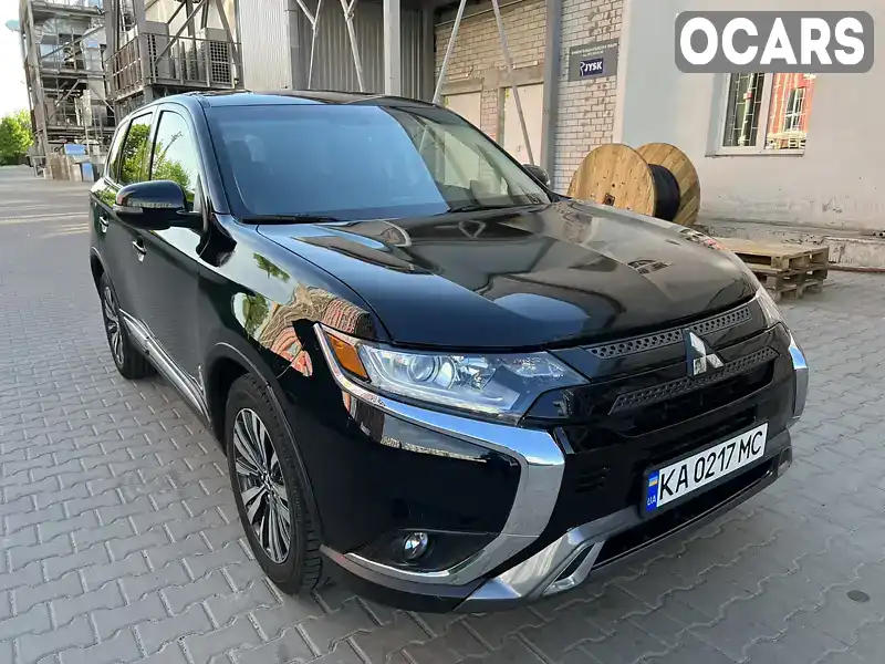 Позашляховик / Кросовер Mitsubishi Outlander 2019 2.36 л. Автомат обл. Київська, Вишневе - Фото 1/21