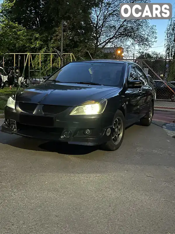 Седан Mitsubishi Lancer 2004 1.58 л. Ручна / Механіка обл. Львівська, Львів - Фото 1/21