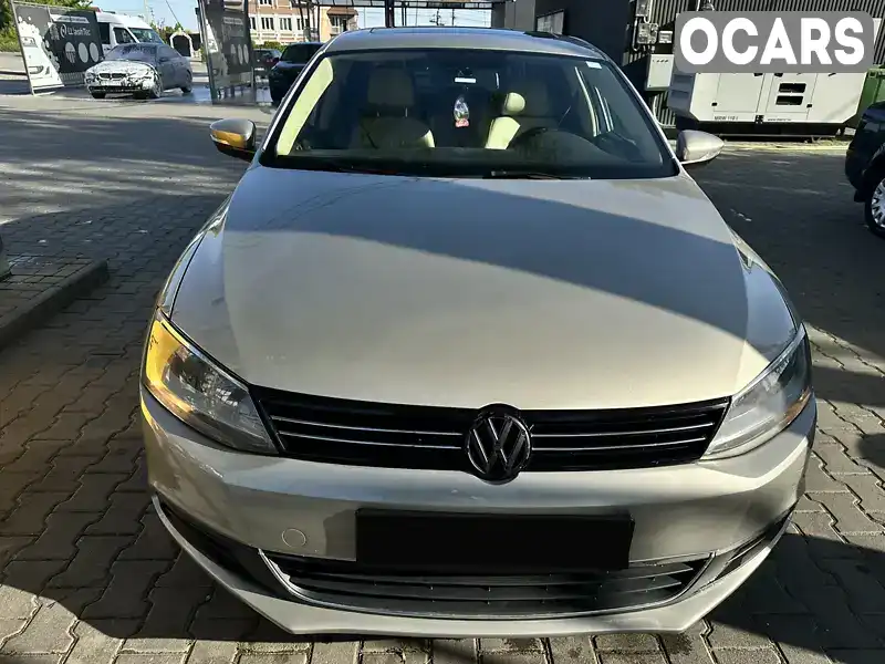 Седан Volkswagen Jetta 2014 1.8 л. Автомат обл. Черновицкая, Черновцы - Фото 1/21