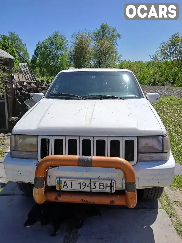 Внедорожник / Кроссовер Jeep Grand Cherokee 1995 5.2 л. Автомат обл. Киевская, Яготин - Фото 1/21