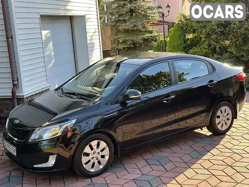 Седан Kia Rio 2013 1.59 л. Автомат обл. Хмельницкая, Хмельницкий - Фото 1/21