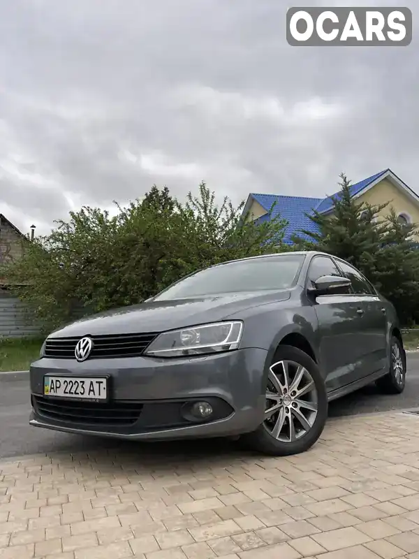 Седан Volkswagen Jetta 2011 1.4 л. обл. Запорожская, Запорожье - Фото 1/9