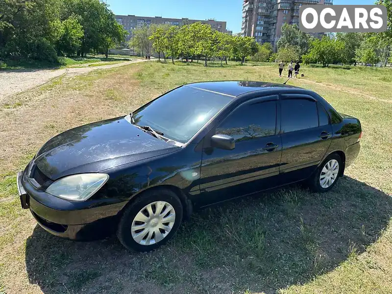 Седан Mitsubishi Lancer 2006 1.58 л. Ручная / Механика обл. Днепропетровская, Днепр (Днепропетровск) - Фото 1/21