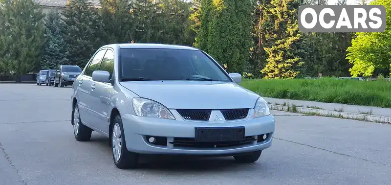 Седан Mitsubishi Lancer 2009 1.6 л. Ручна / Механіка обл. Дніпропетровська, Жовті Води - Фото 1/21