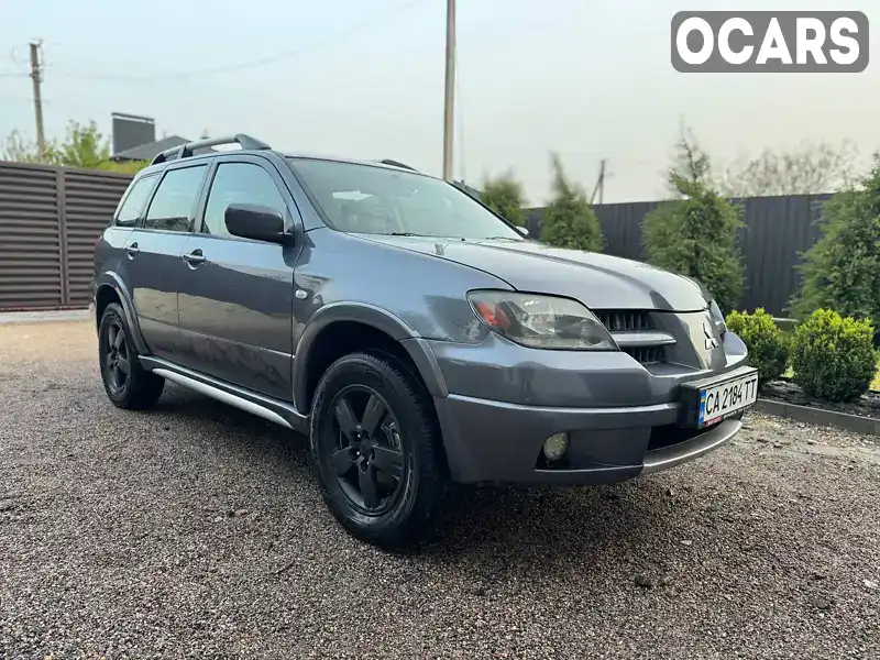 Внедорожник / Кроссовер Mitsubishi Outlander 2006 2.4 л. Автомат обл. Черкасская, Черкассы - Фото 1/18